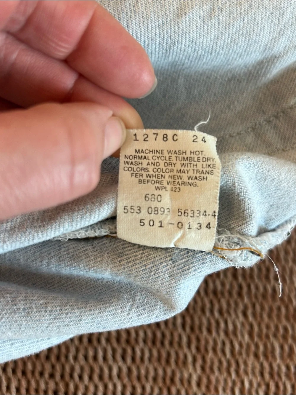 Vintage 1993 men's Levi's 501 light blue denim jeans with leather patch 38×34